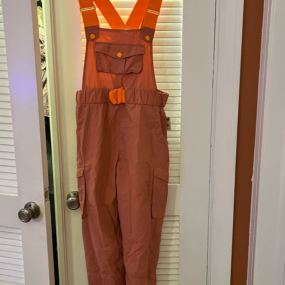 Vibrant Orange Jumpsuit with Adjustable Straps and Relaxed Fit